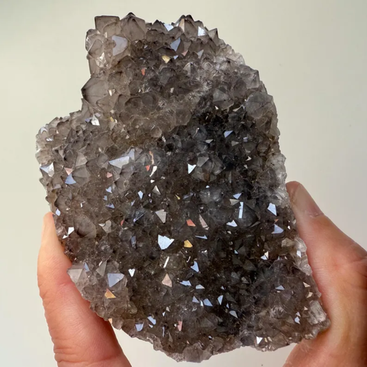 Smoky Quartz Cluster For grounding, protection, and calm strength.